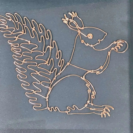 A Framed handmade wire Squirrel