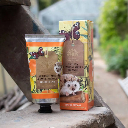 Hand cream and its packaging on a wooden surface with a natural background